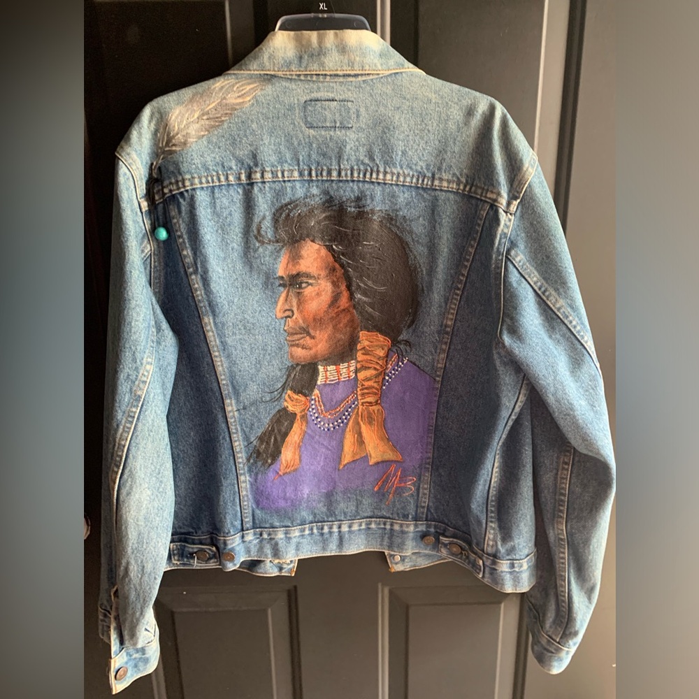 One of a kind Authentic Levi Jean jacket with painted chief on the back